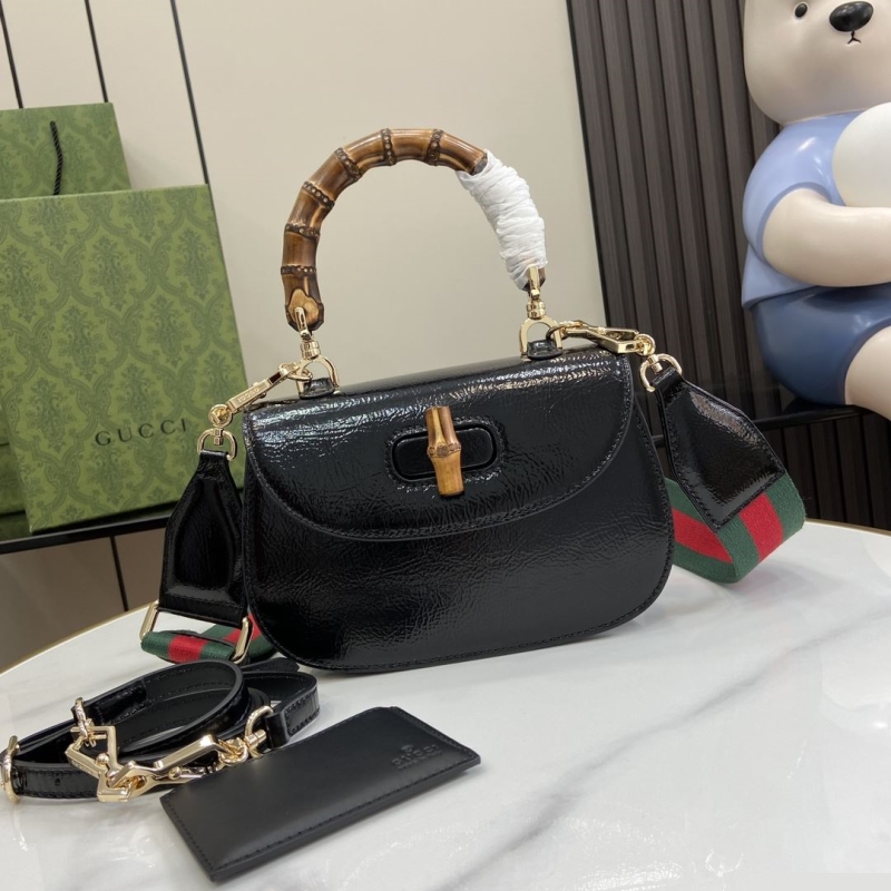 G*u*i top handle bags